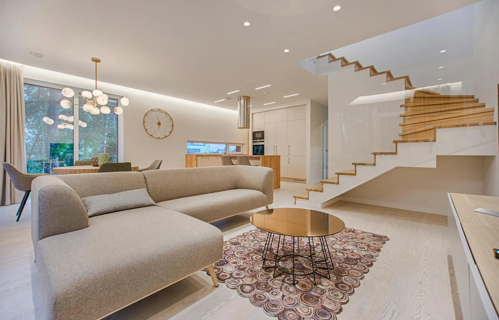 Modern living room with floating staircase