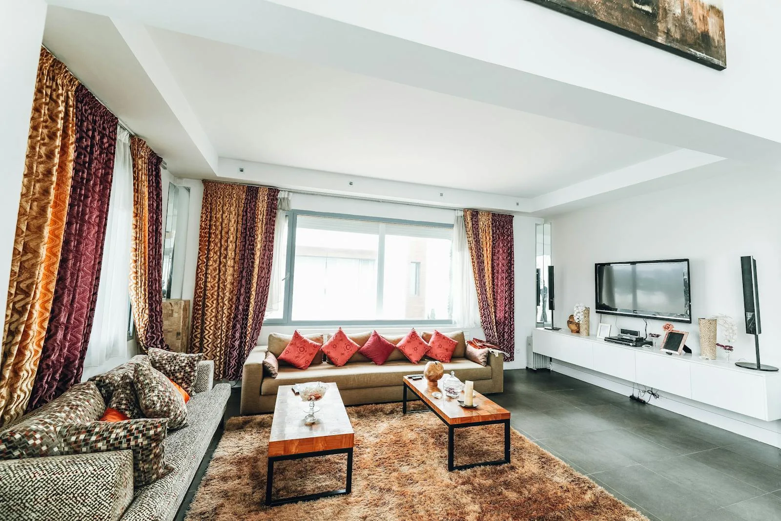 Modern residential apartment interior with curtains and art