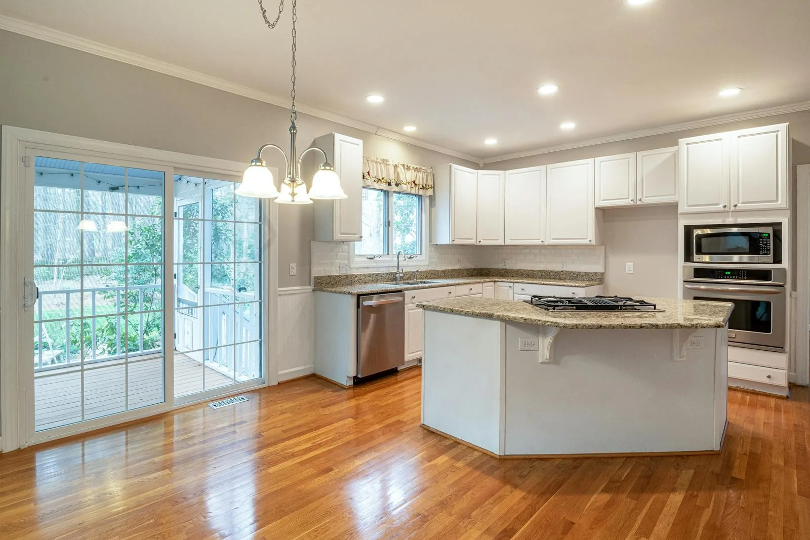Classic white kitchen with wooden floor